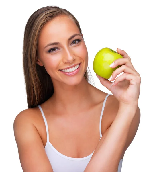 一个年轻的女人笑着抱着一个孤立的苹果 — 图库照片