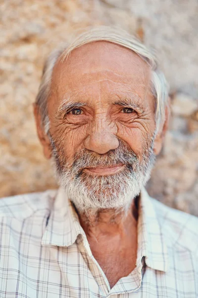 Life smiles at me, so I keep smiling back. Portrait of a confident senior man outdoors. Stock Picture