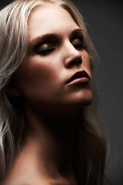 Serene in her sensuality. Closeup of a beautiful young woman in the studio. — Stock Photo, Image