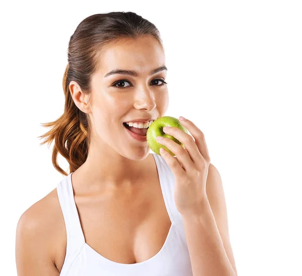 Porta-te bem. Tiro cortado de uma jovem mulher saudável comendo uma maçã. — Fotografia de Stock