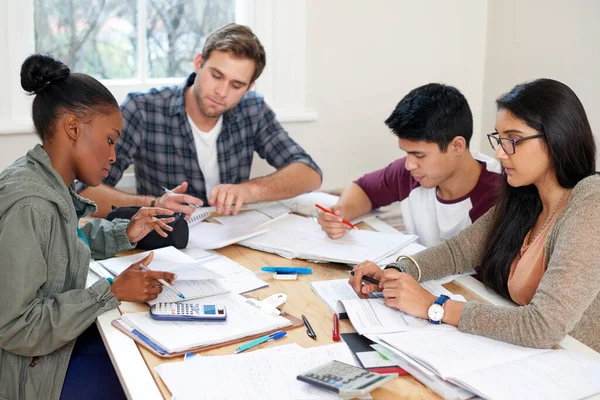 Their finals prep is going well. Cropped shot of a group of university students in a study group. — ストック写真