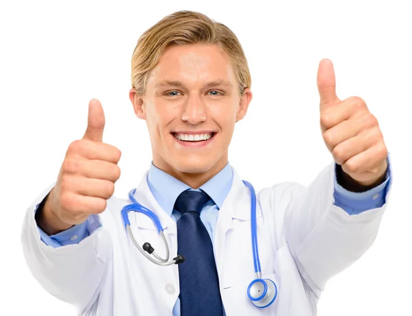 Youre on the road to recovery. Shot of a handsome young doctor standing alone in the studio and showing a thumbs up. — Stock Photo, Image