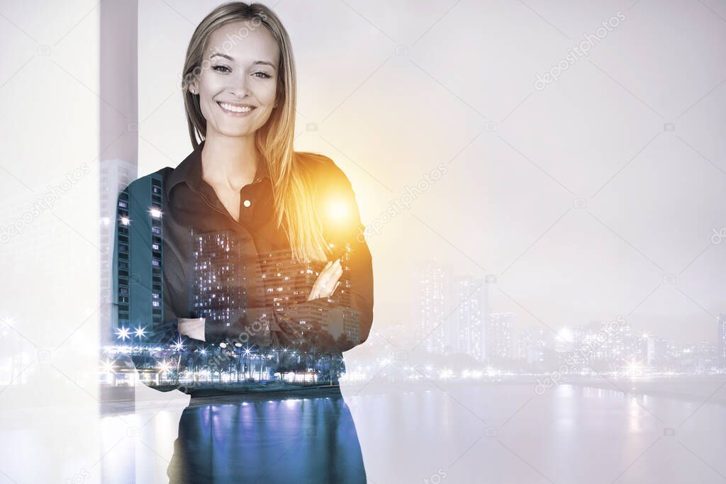 Success in the city. Multiple exposure portrait of a beautiful woman superimposed over a city.