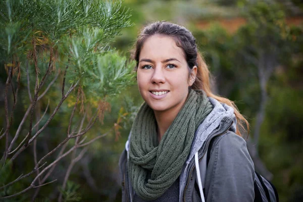 Immersed in nature. Portrait of an attractive young female hiker in the outdoors. —  Fotos de Stock