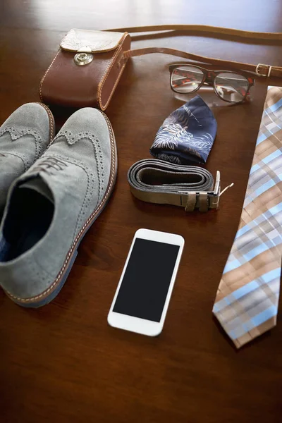 Get ready to step into success. High angle shot of a stylish business outfit and accessories laid out on a table. — ストック写真