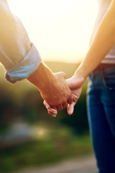 Wherever you go, Ill follow. Closeup shot of an unrecognizable couple holding hands outdoors. —  Fotos de Stock