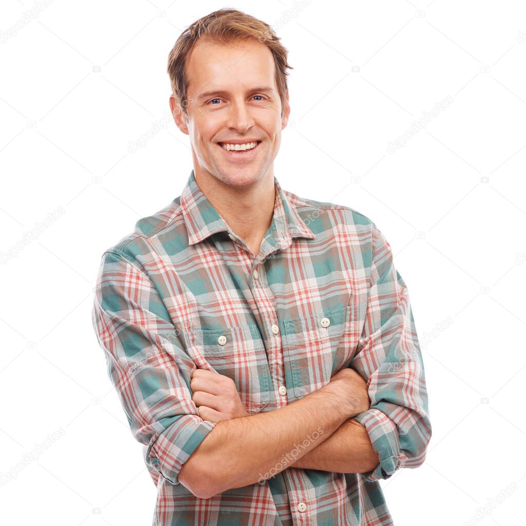 Enjoying the casual life. Studio portrait of a young man standing with his arms folded.