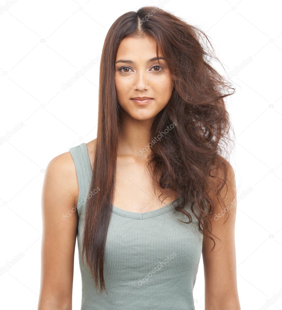 Its amazing what a little styling can do.... Portrait of a beautiful woman with sleek hair on her one side, and frizzy hair on the other.