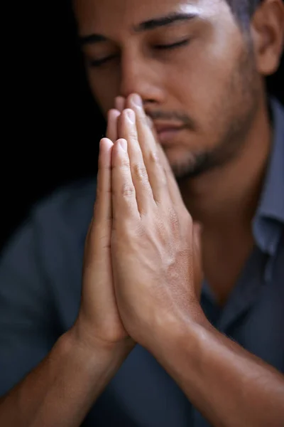 Praying for guidance and strength. Cropped shot of a young man holding his hands together in prayer. — 스톡 사진