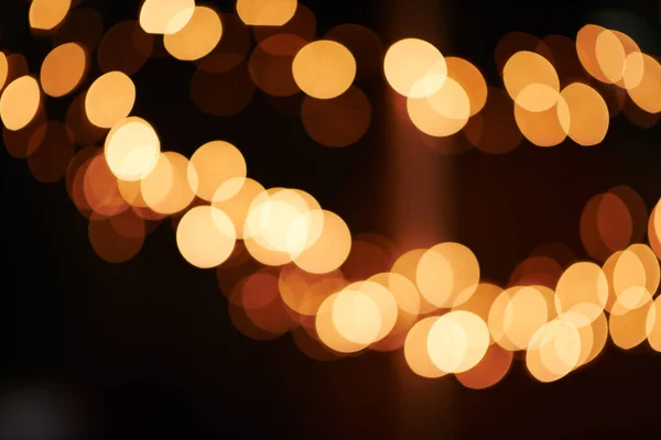 Illumina la tua vita. Girato di luci brillanti offuscate sullo sfondo di un ambiente buio. — Foto Stock