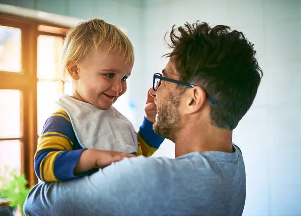 The best is being your dad. Cropped shot of a single father holding his son at home. — Stock Photo, Image