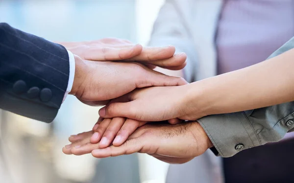 We can do this. Shot of a group of unrecognizable businesspeople stacking their hands. — Stock Photo, Image