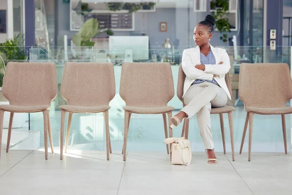 She brought the best version of herself to this interview. Shot of a young businesswoman sitting in a waiting room at work.