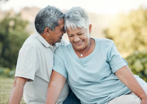 The bond that links your true family is not blood. Shot of a senior couple enjoying a picnic outside. — Stock Photo, Image