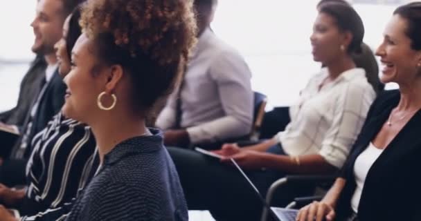 Business advancements deserve a round of applause. 4k footage of a group of businesspeople clapping hands while sitting in a conference. — Video Stock