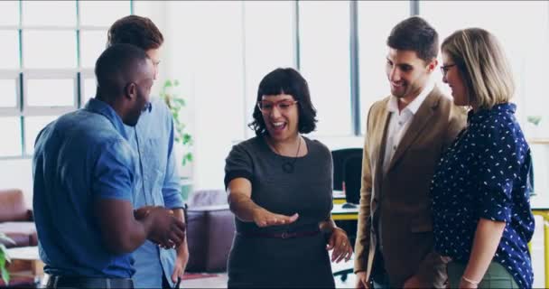 Another fine job guys. 4K video footage of a group of coworkers celebrating success in a modern office. — Video Stock