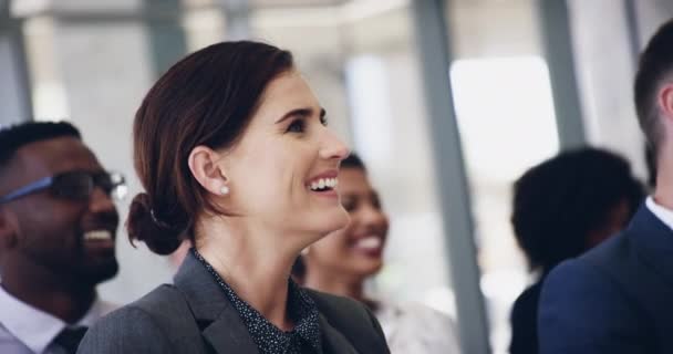 The more you know the greater your chances are. 4k footage of a group of businesspeople attending a conference. — Vídeo de stock