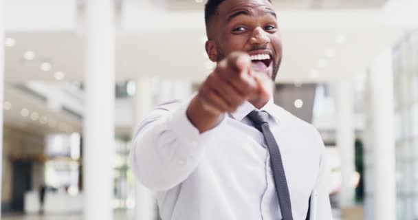 You cant spell success without U. 4k video footage of a happy young businessman clapping in a modern office. — Stock video