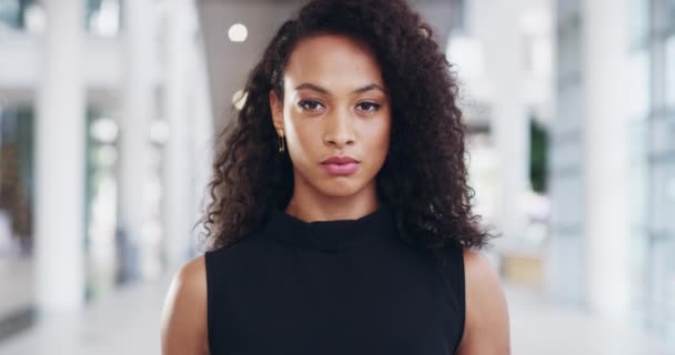 Know your level of worth and top it. 4k video footage of a confident young businesswoman working in a modern office. — Vídeo de stock