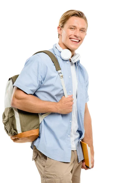 Mi sono concentrata sul conseguimento della laurea. Girato di un bel giovane studente in piedi da solo in studio e tenendo i suoi libri di testo. — Foto Stock