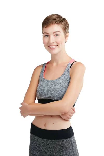 Past goed. Studio portret van een fit jonge vrouw poseren tegen een witte achtergrond. — Stockfoto