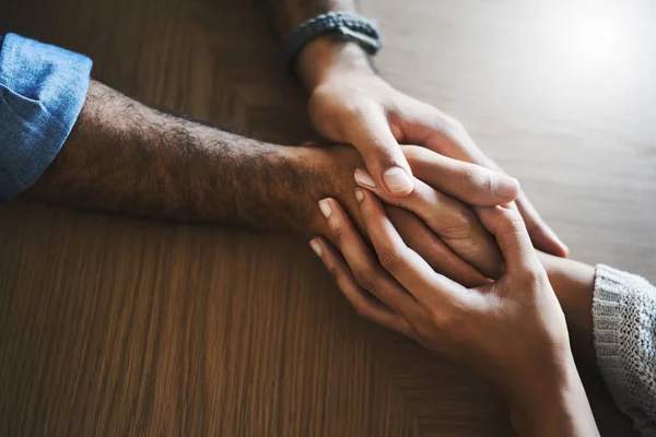 You make my life better by being in it. Cropped shot of a man and woman compassionately holding hands at a table. — Stock Photo, Image