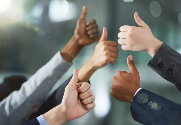 You did it. Shot of a group of office workers giving thumbs up together. — Stock Photo, Image