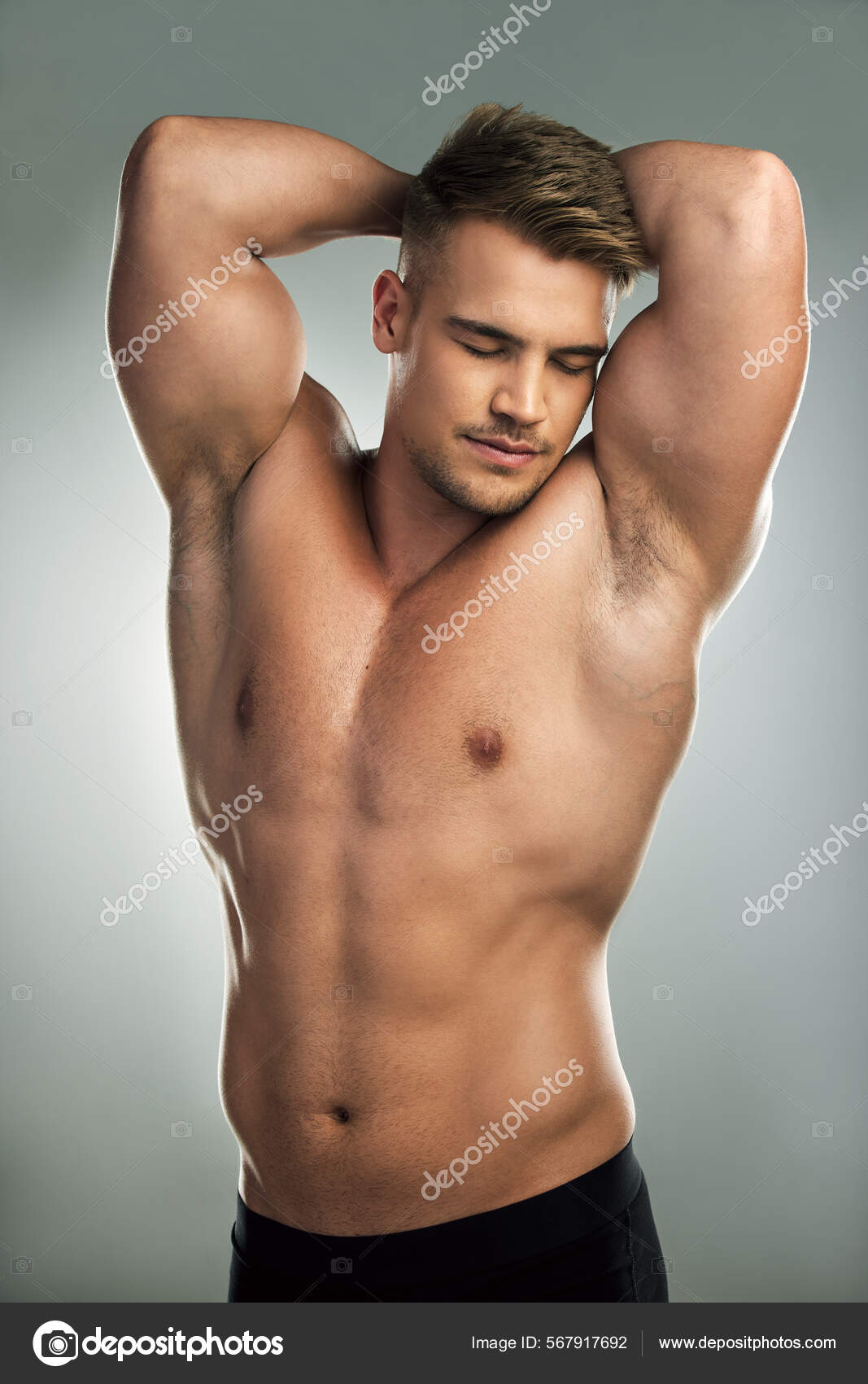 Handsome and muscular male model with a chiseled physique Stock