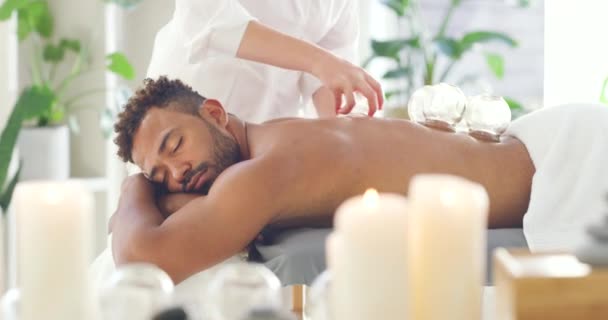 Mixed Race Man Getting Back Massage Vacuum Cup Hispanic Man — Stock Video