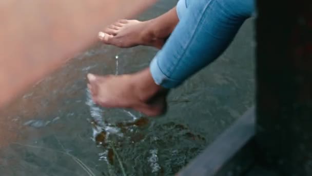 Closeup Barefoot Person Dipping Feet Water Dock Summer Day One — Stockvideo