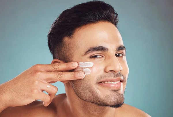 Portrait One Smiling Young Indian Man Applying Moisturiser Lotion His — Stock Photo, Image
