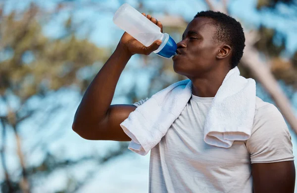 Young Active Black Male Athlete Holding Bottle Drinking Water Towel — Fotografia de Stock