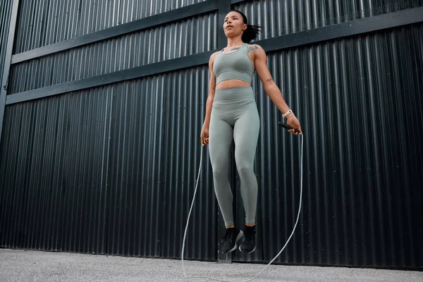 One Young African American Female Athlete Skipping Using Jump Rope — Fotografia de Stock