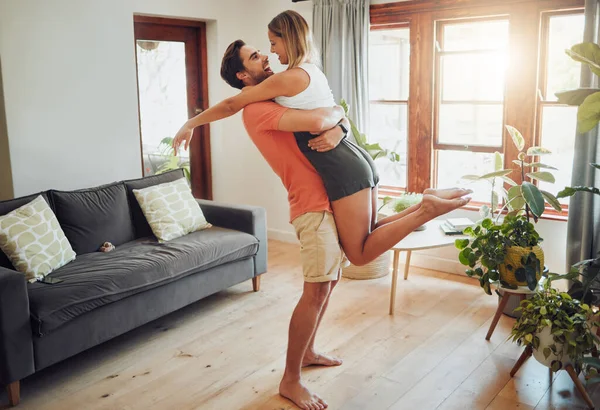 Happy Young Boyfriend Holding Girlfriend Arms Lifts Her While Look — Foto Stock