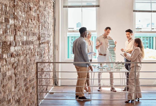 Group Diverse Architects Discussing Plans Blueprints Schematics Meeting Office Boardroom — Foto Stock