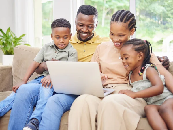 Shot Young Family Sitting Sofa Together Home Using Laptop — Stockfoto