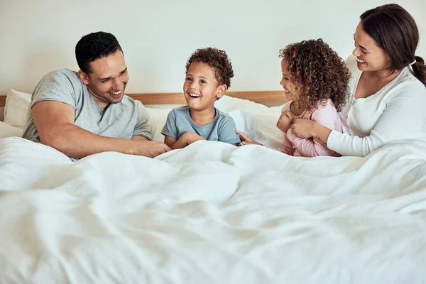 Mixed Race Family Lying Bed Smiling Playing Latino Parents Having — Stock fotografie