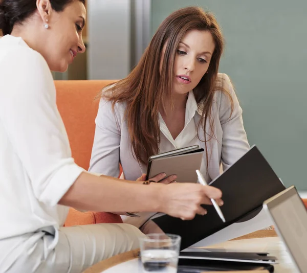 Two Business Women Laptops Notepads Having Meeting Office — Foto de Stock
