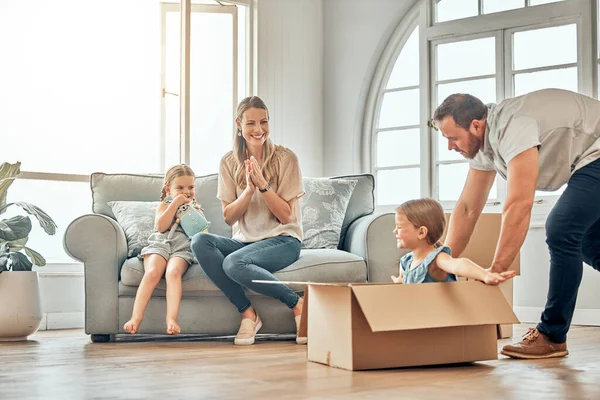 Happy Mature Father Pushing His Daughter Box Mom Sister Sit — Foto Stock