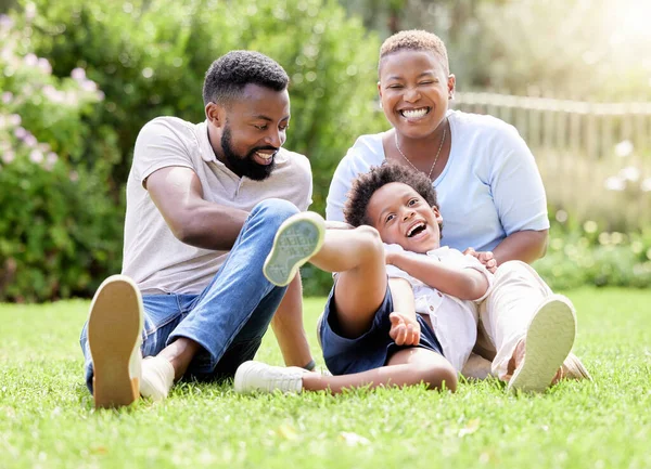 Shot Mother Father Tickling Son While Relaxing Together Outdoors — kuvapankkivalokuva