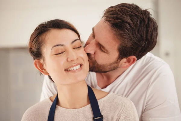 Shot Man Kissing His Wife Her Cheek Home — Stock Photo, Image