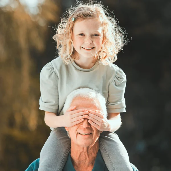 Shot Girl Being Carried Her Grandfather — Stock fotografie