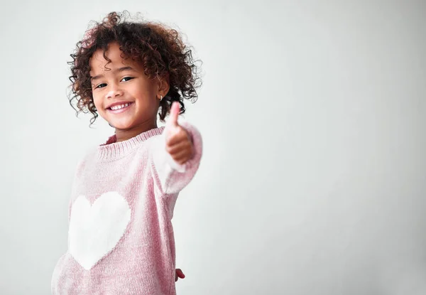 Shot Adorable Little Girl Standing Alone Showing Thumbs Grey Background — 스톡 사진