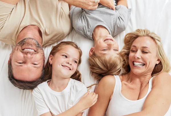 Shot Beautiful Young Family Bonding Bed Together —  Fotos de Stock