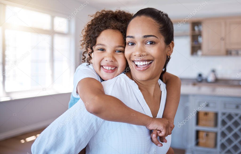 Portrait of a little girl bonding with her mother at home.