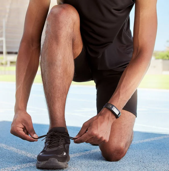 Athlete Preparing Race Track Closeup Athlete Fastening His Sneakers Prevent — Fotografia de Stock