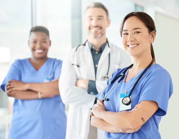 Shot of a group of medical practitioners standing together in a hospital.