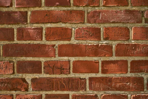 Closeup Old Red Brick Wall Carvings Copyspace Zoom Different Size — Zdjęcie stockowe