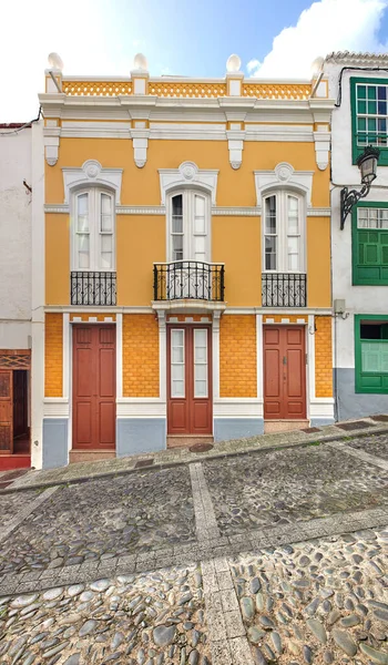 Colorful buildings in the streets of Santa Cruz de La Palma. Houses or homes built in a vintage architecture design in a small town or village. Bright and vibrant city for vacations or holidays.
