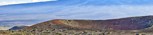 Panoramic view of mountain landscape in Hawaii, USA with a background of blue sky and copyspace. Open field of nature and ecological life near the worlds largest active volcano on earth.